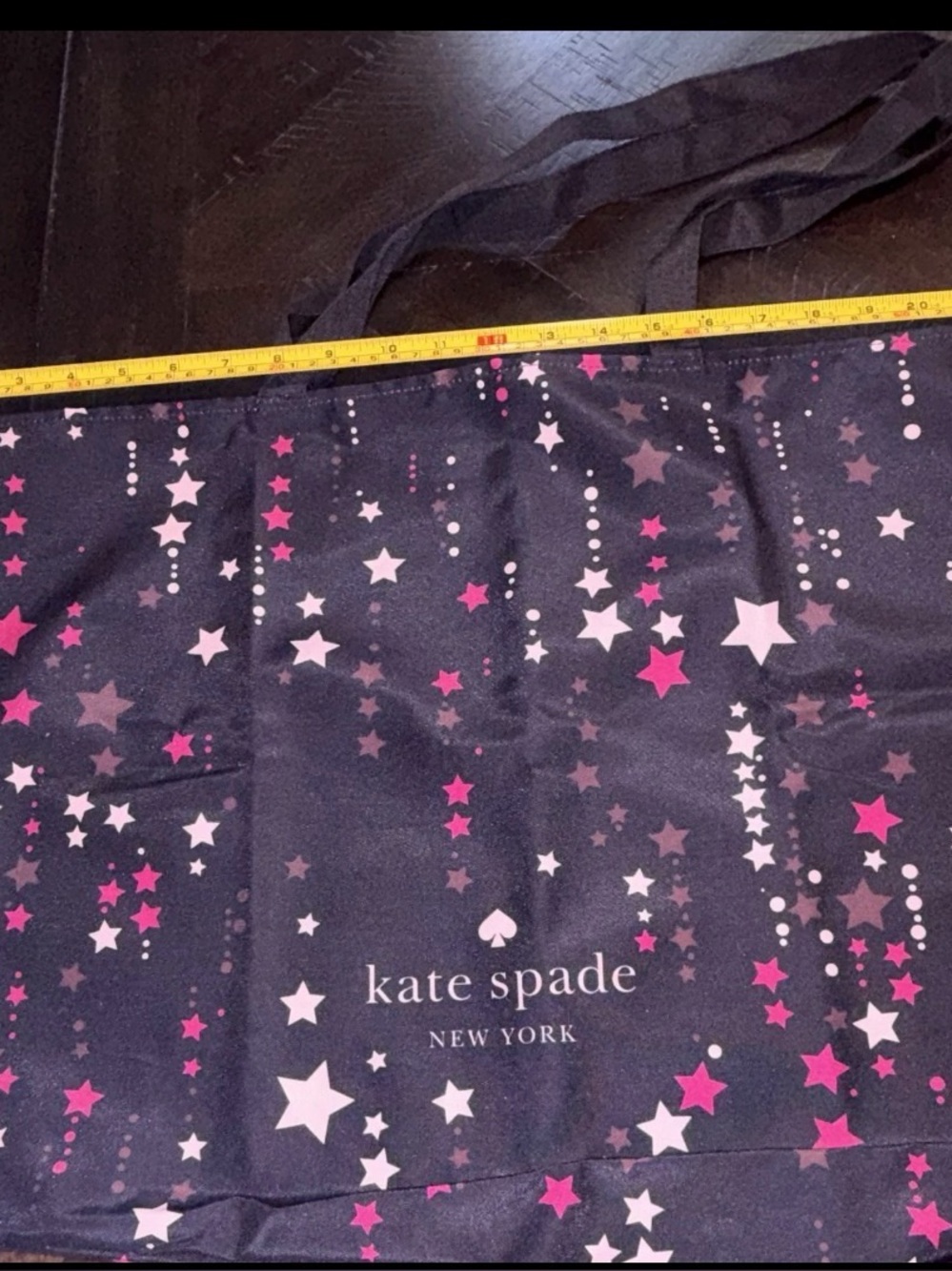 kate spade black tote with pink and light pink star cascade